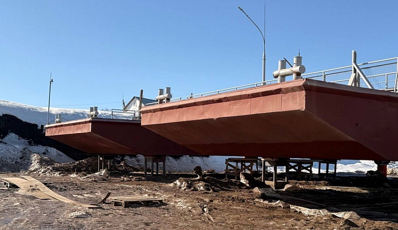 В Дугне продолжается ремонт наплавного моста через Оку